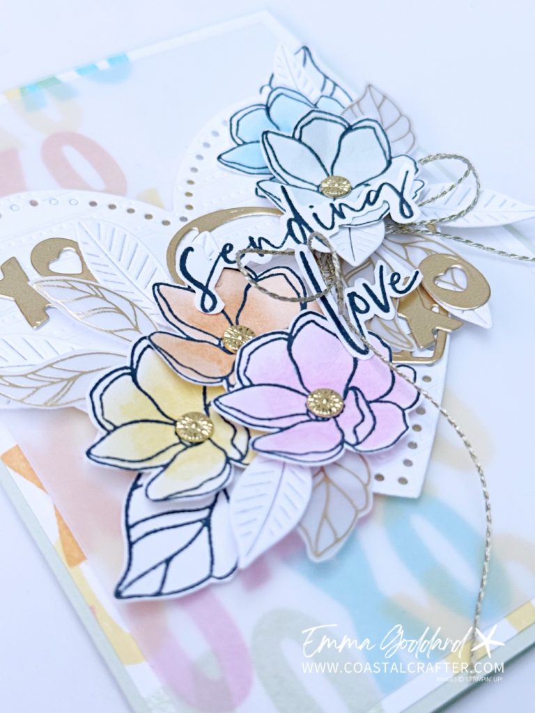 Pastel Valentine’s card with die cut heart, stamped background and vellum layer