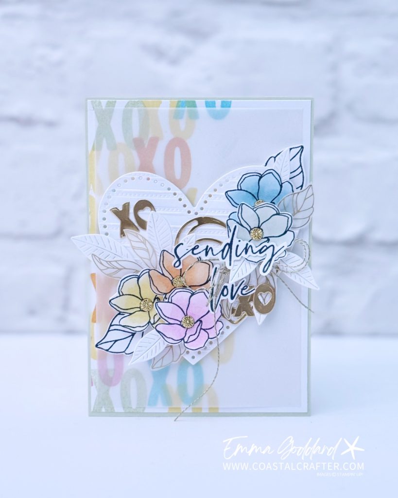 Pastel Valentine’s card with die cut heart, stamped background and vellum layer