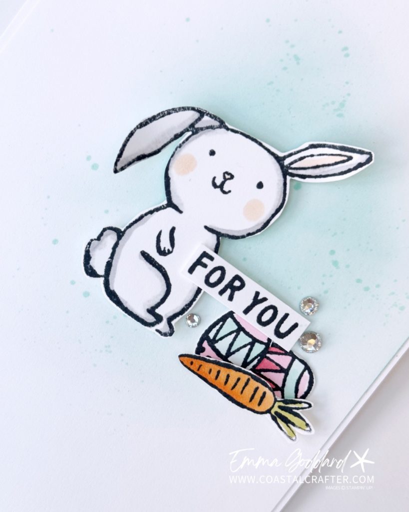 Clean and Simple handmade card featuring a bunny image, white space, soft Pool Party ink blending, Stampin’ Blends colouring, and silver rhinestones.